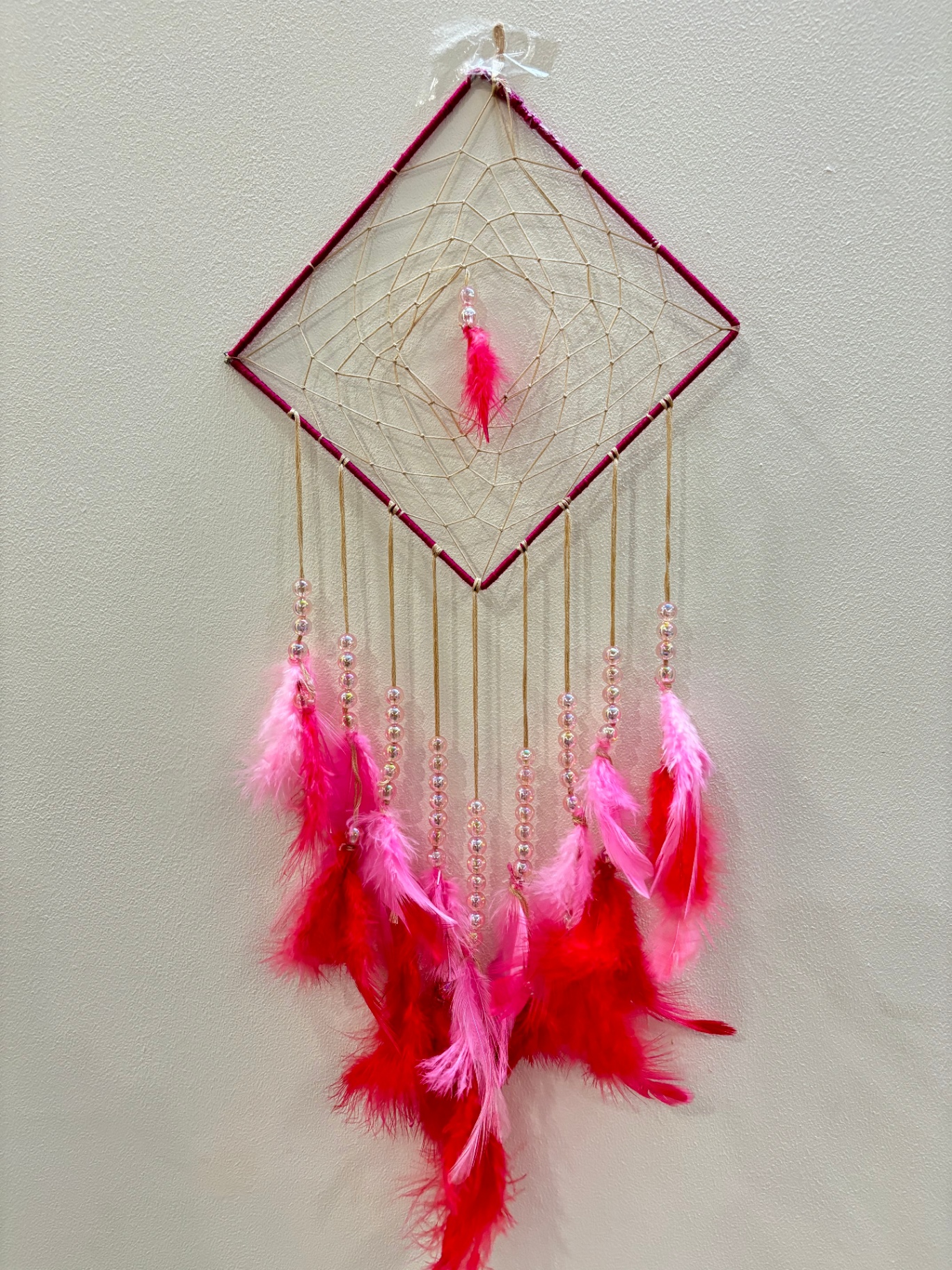 Pink diamond dream catcher with pink feathers and beads