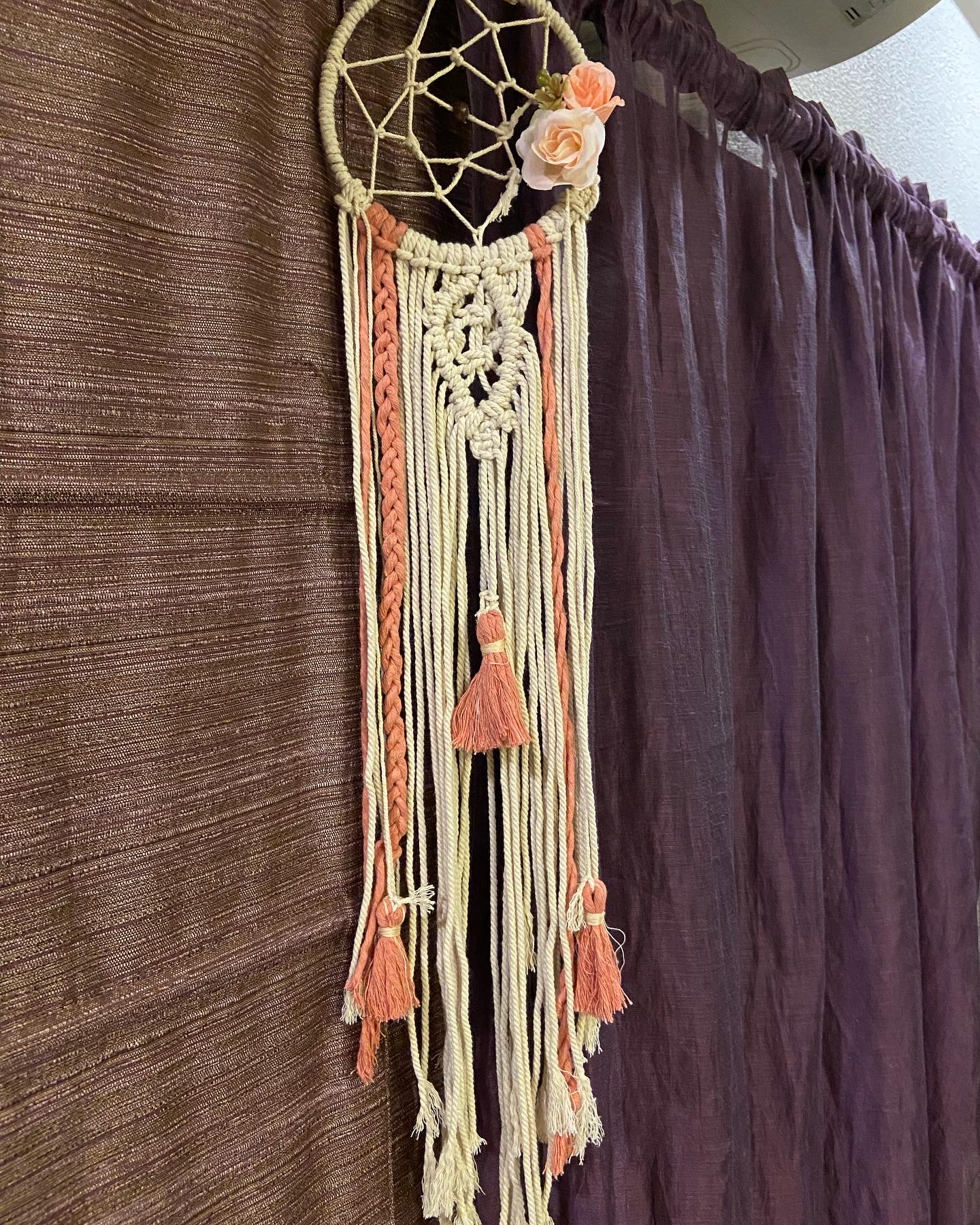 Macramé dream catcher with coral tassels and blush roses