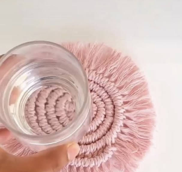 Blush pink macramé fringed coaster with glass